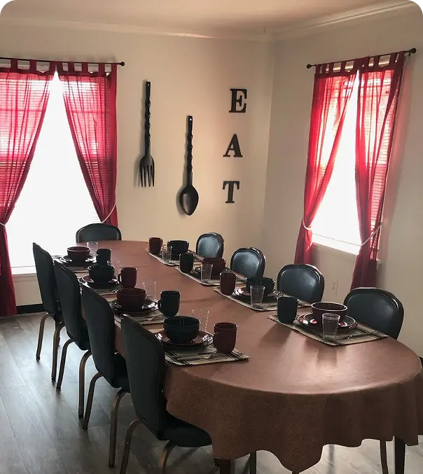 Communal dining room at assisted living & hospice care house in Kentwood, MI